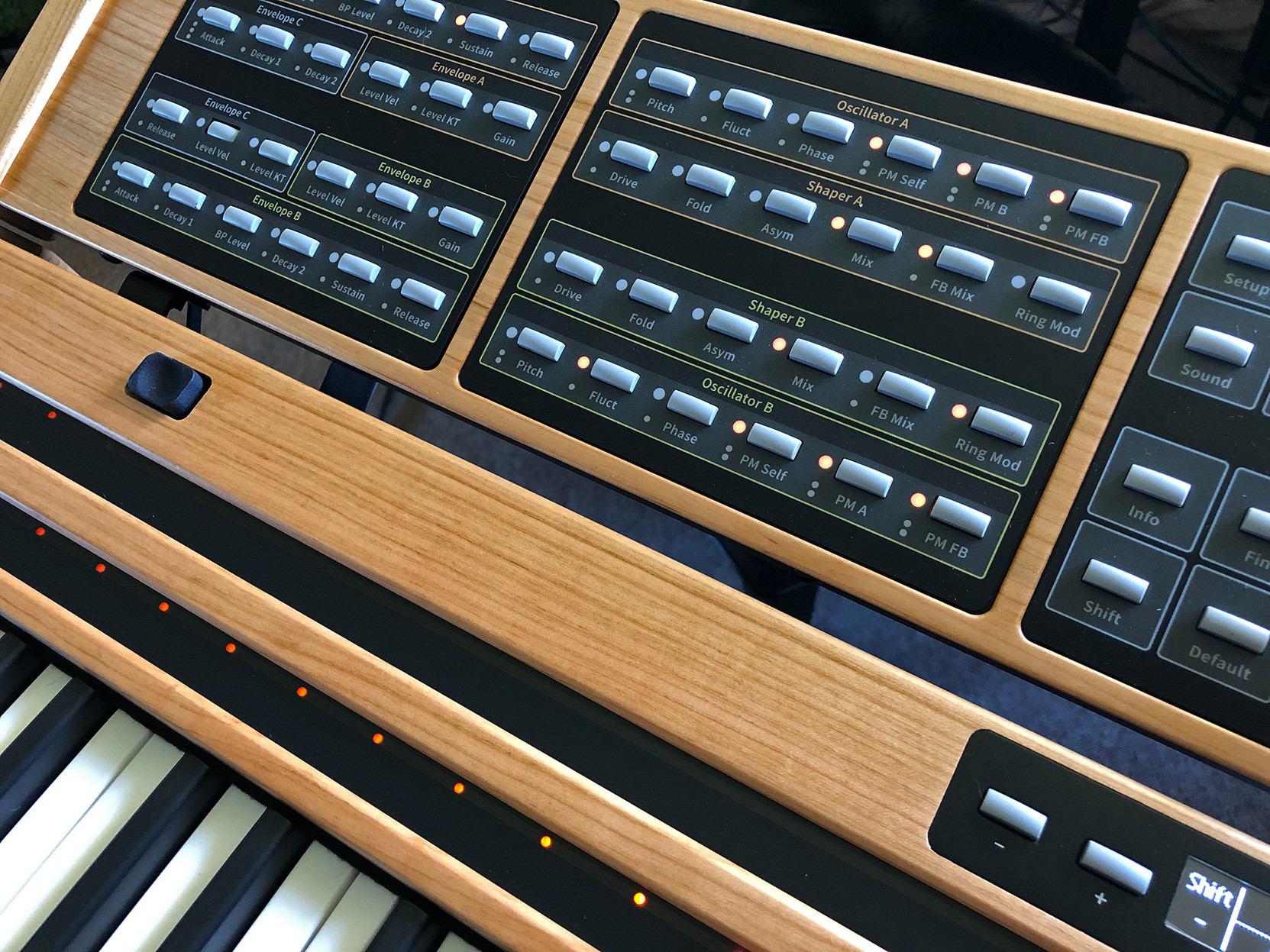 Closeup of status lights on control panel and ribbon controller of the C15 synthsizer.