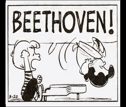 Second frame:

Schroeder raises his fist in the air, and shouts “BEETHOVEN!”

Lucy is blown away, somersaulting backwards.