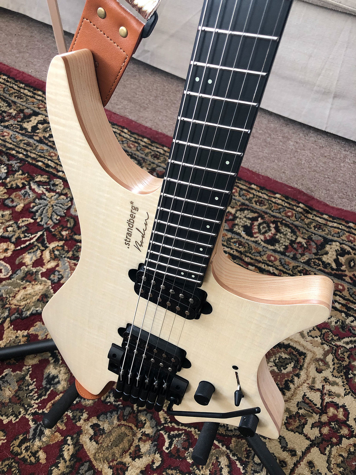 Looking down at the guitar, you can see the layers of wood … 

flame maple veneer, solid maple top, and the chambered swamp ash body.