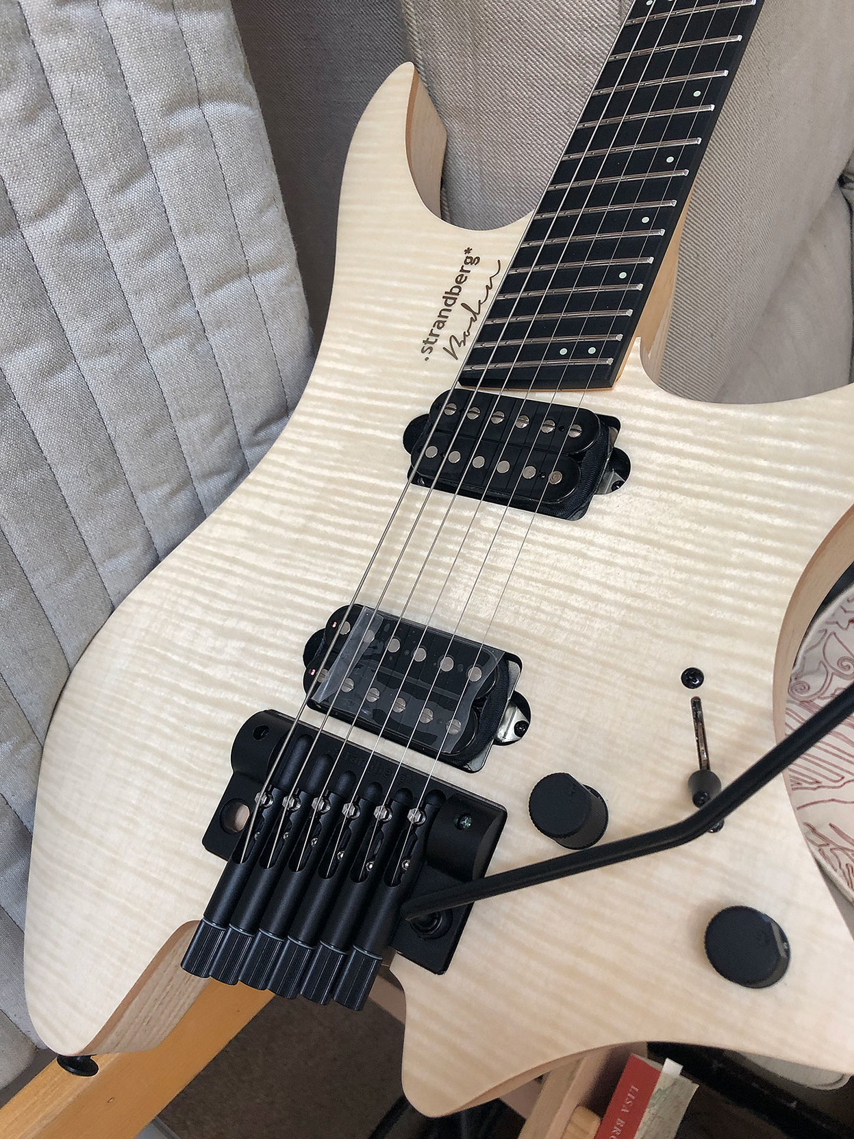 Here’s a view where the light catches the flame maple grain just right … 

it seems to glow from within. 