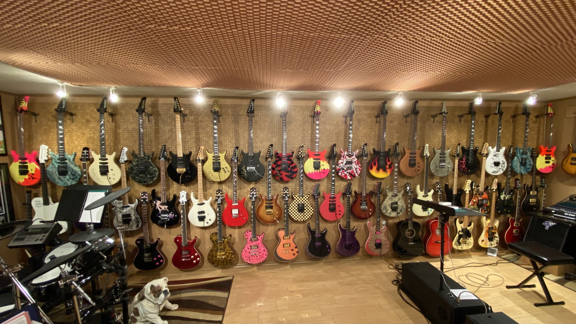 A private studio, with over 50 (!) electric guitars hanging on the far wall.

(A pretty amazing collection, I might add.)