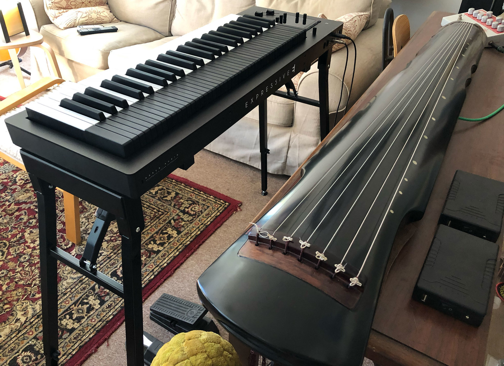 On the left: an Expressive-E Osmose keyboard … and on the right, a Chinese guqin, with pickups and a dedicated preamp.