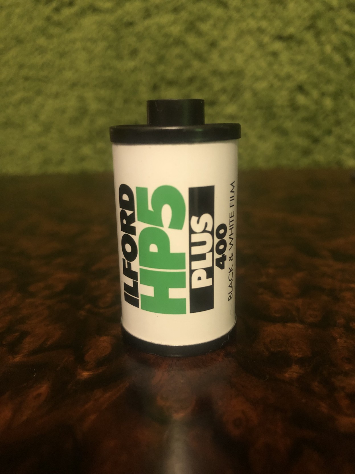 A little roll of Ilford HP5 Plus 35mm black and white film.