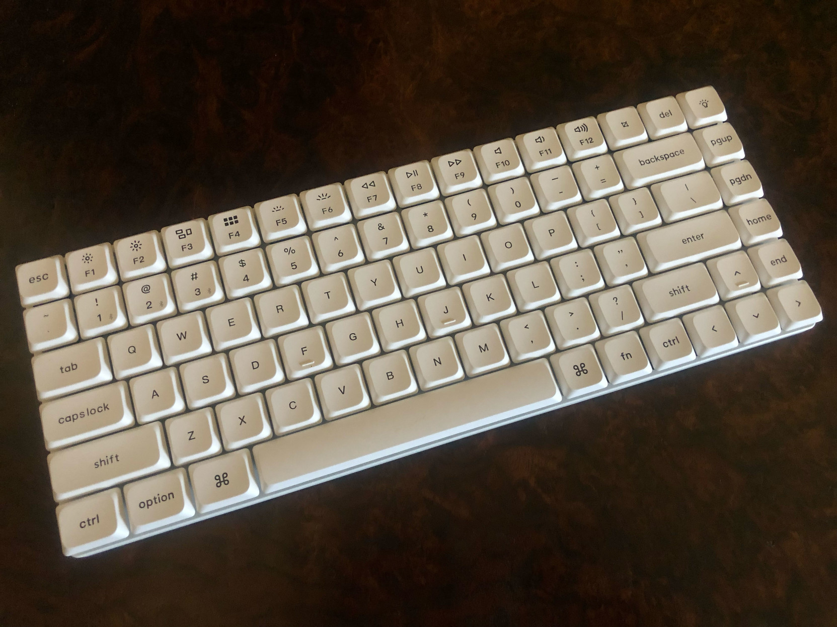 I got the white one! Solid, and tactile as all get-out.