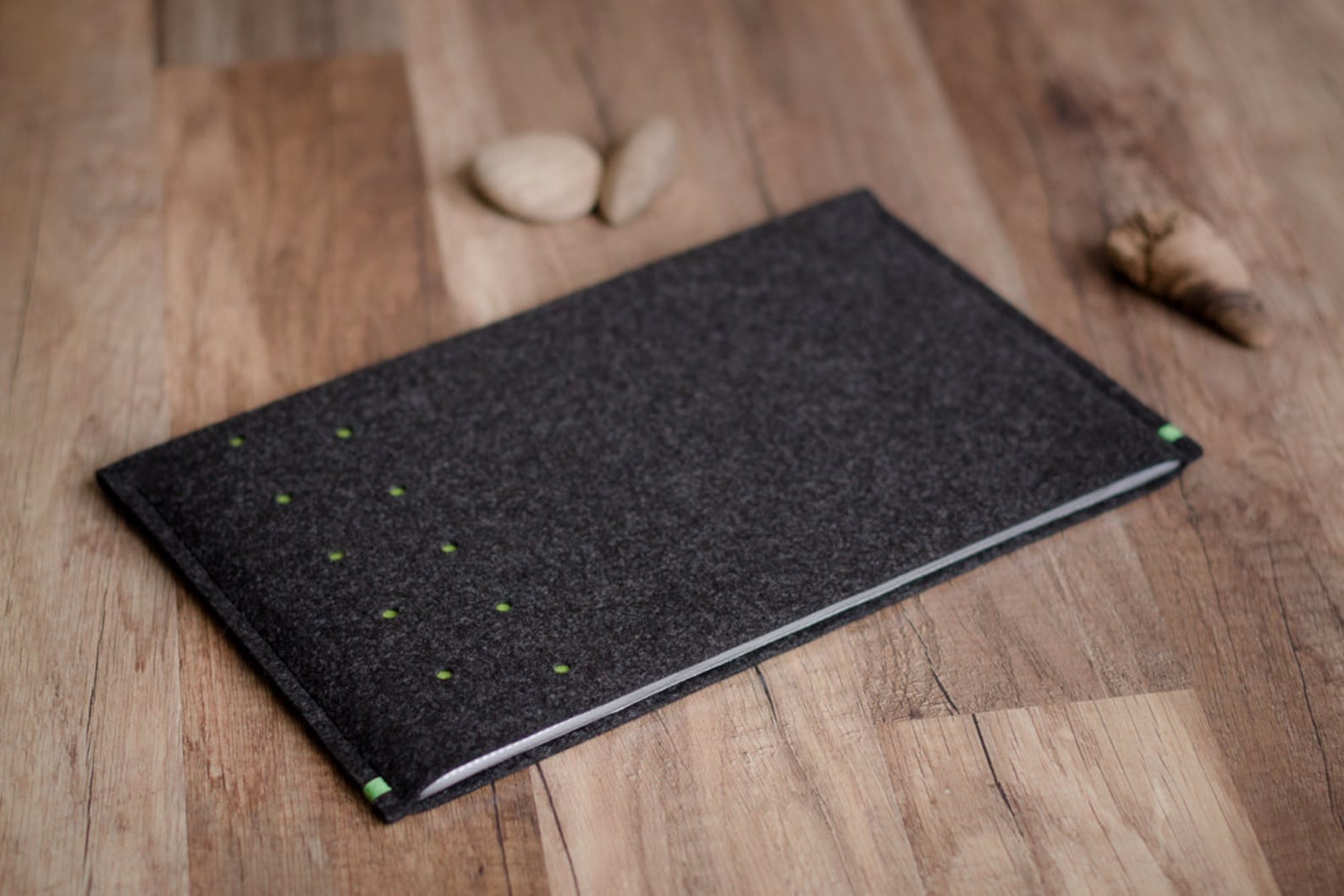 I’ve bought a number of felt sleeves from Sabine in Latvia … her store is “phocket” on Etsy.com. Her work is gorgeous, and fantastically durable.