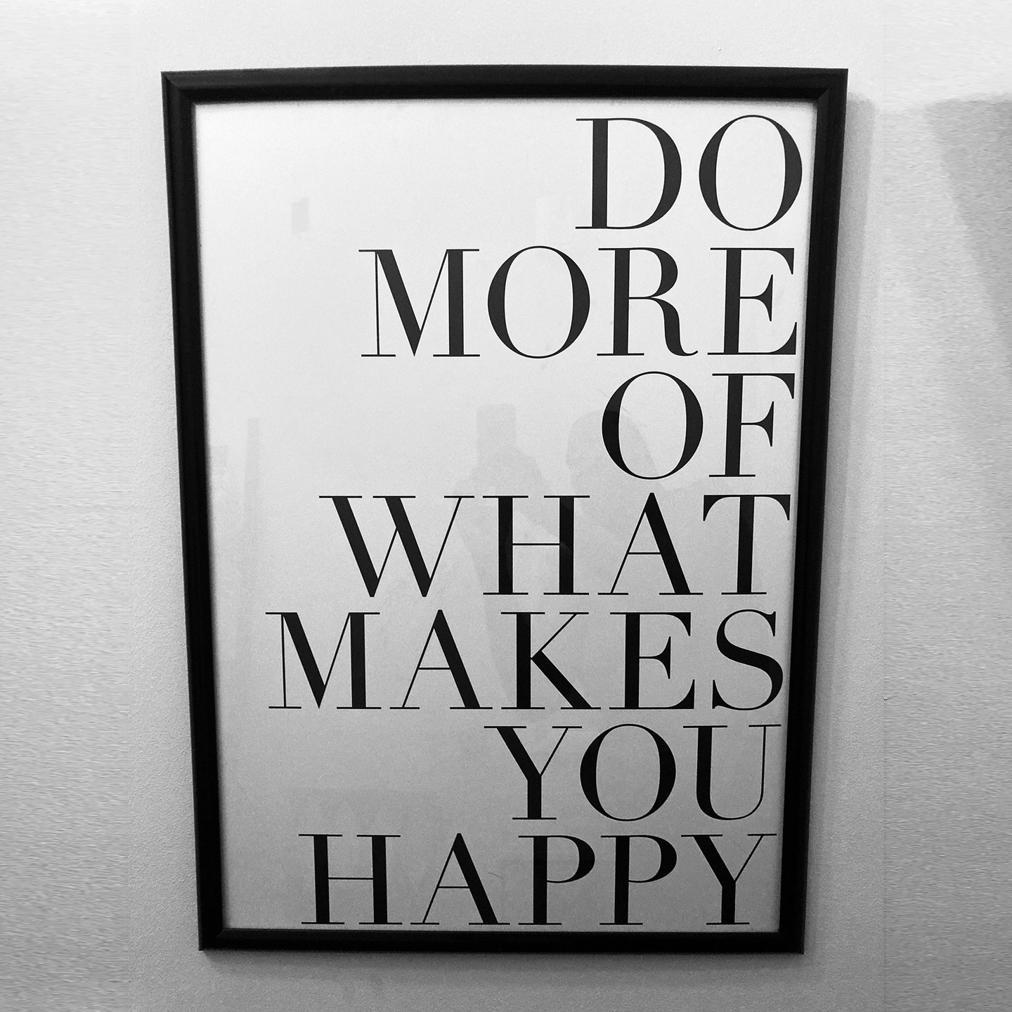 A sign that says “Do More Of What Makes You Happy”