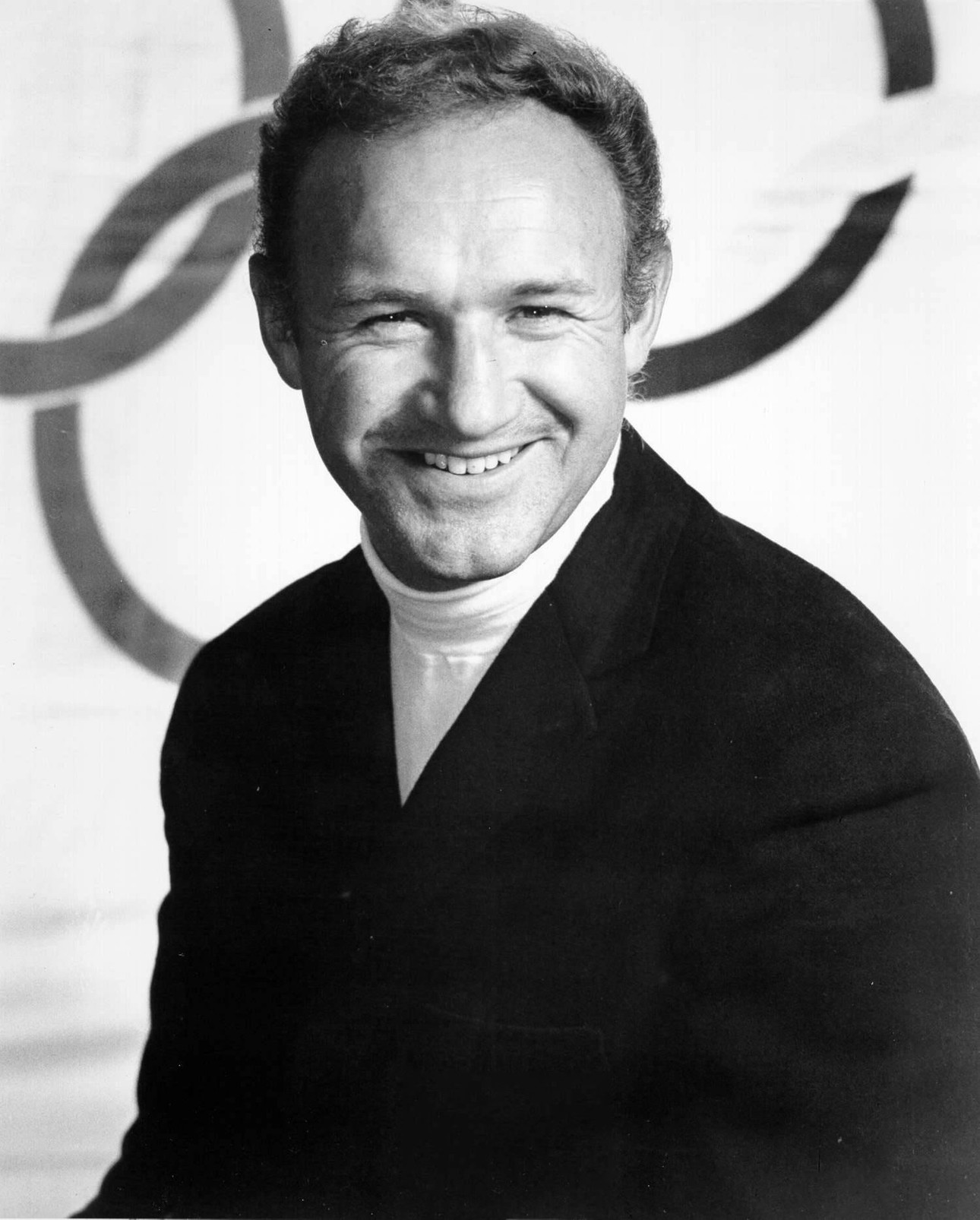 Gene Hackman, wearing a turtleneck.