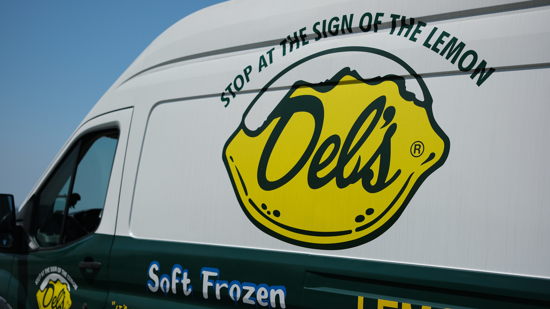 It’s impossible to overstate how essential Del’s Frozen Lemonade is to every Rhode Island summer. It’s delicious, refreshing, and one of our great state rituals. 

This is the yellow lemon logo on the side of one of their ubiquitous trucks – you can find one wherever people are having fun.