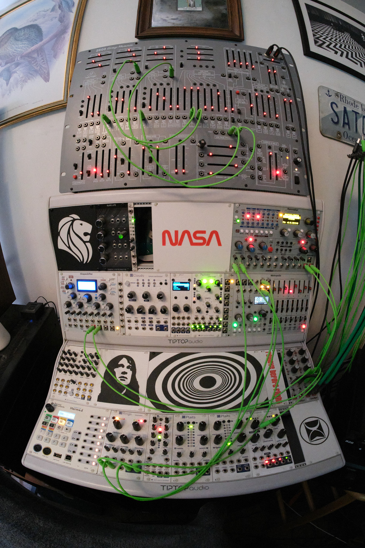 my Eurorack setup, blinking away, nicely distorted by the fisheye lens.