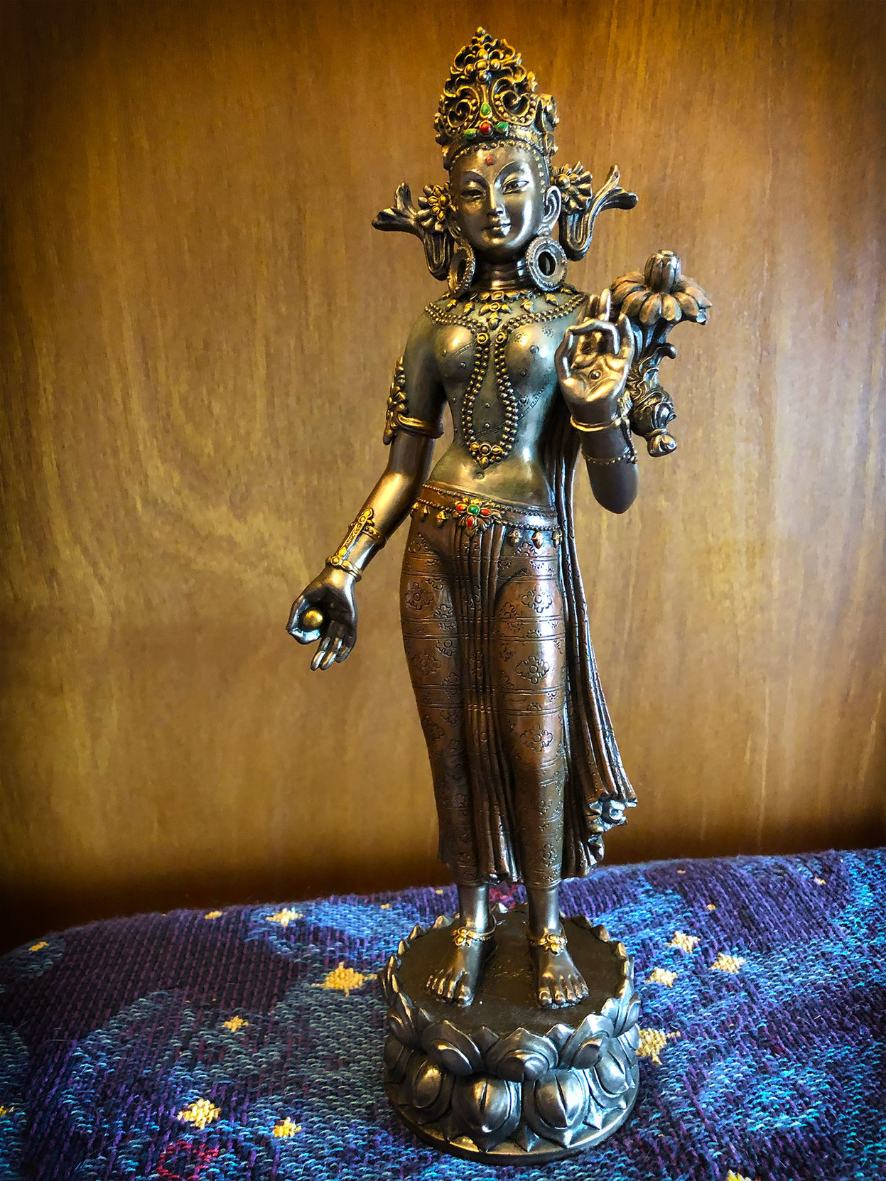 An impressive figure of Green Tara, who now takes her place on my studio altar.

“Tara is the Buddha of Enlightened Activity. 

Tara (Drolma in Tibetan) is often just called the “saviouress”, not just in the sense of spiritual salvation, but also as a rescuer of beings suffering in samsara here and now. 

Just as a child might call out for her mother if she is in danger, devout Tibetan Buddhists tend to call out for Tara in times of need.”