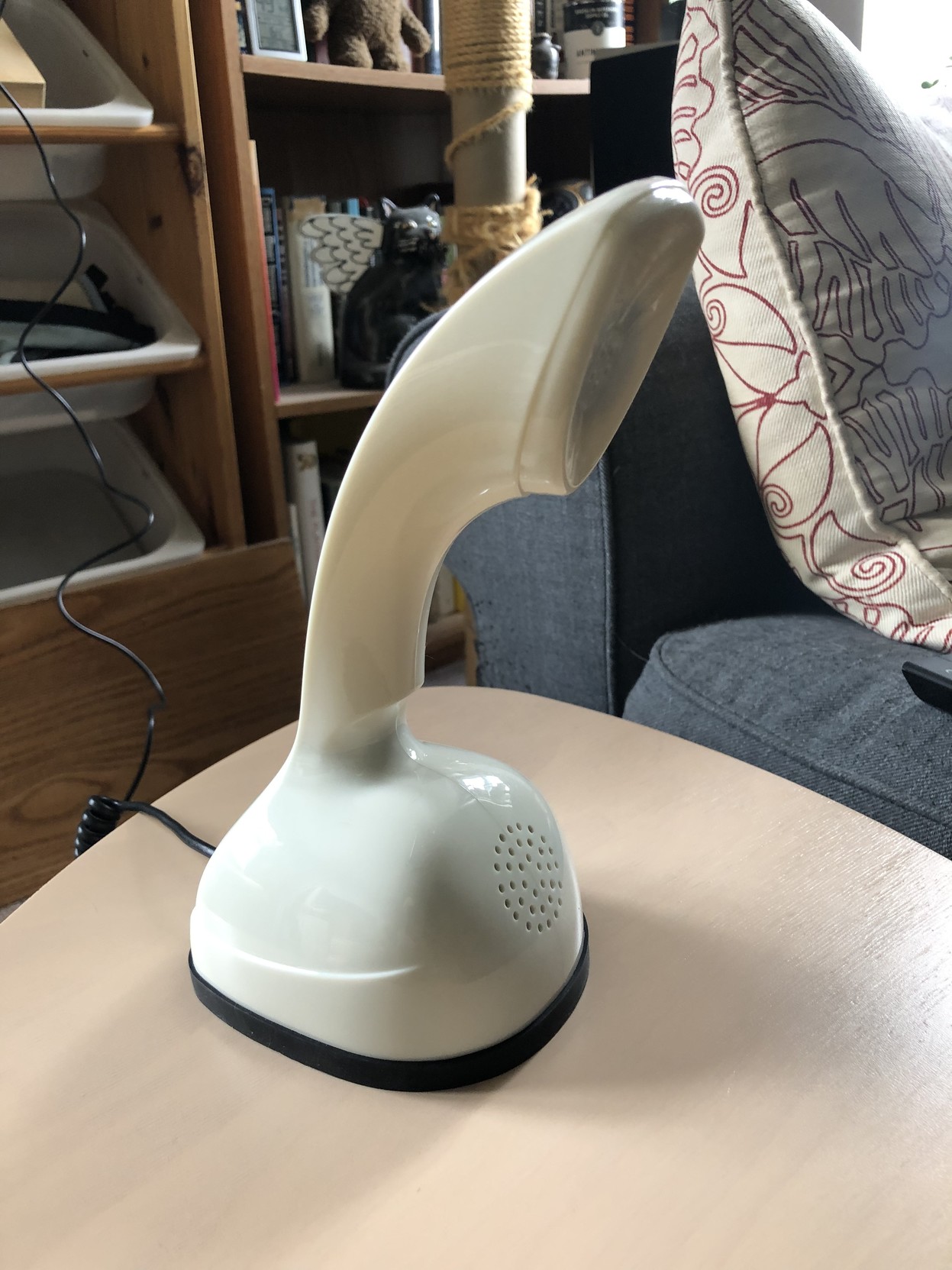 Called a Scandiphone, it’s a remake of the ’50s Ericofon, ready to plug right in to modern phone lines. 

Mine’s plugged into an Ooma VOIP box …  it works great!
