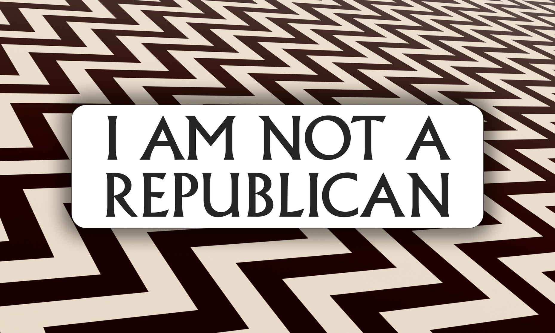 A good replica of my magnetic “I AM NOT A REPUBLICAN” bumper sticker, depicted floating over the zigzag floor of David Lynch’s Black Lodge.

(The zigzags are *not* part of the bumper sticker design.)
