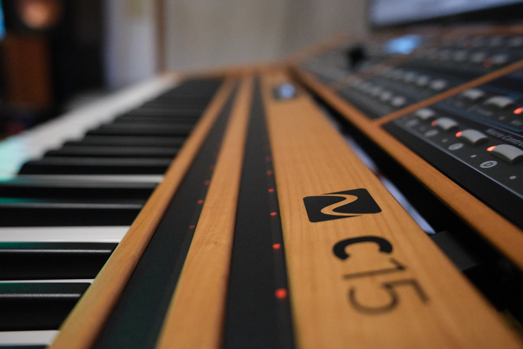 The C15 synth, shot from one end of the keyboard with shallow depth of field.