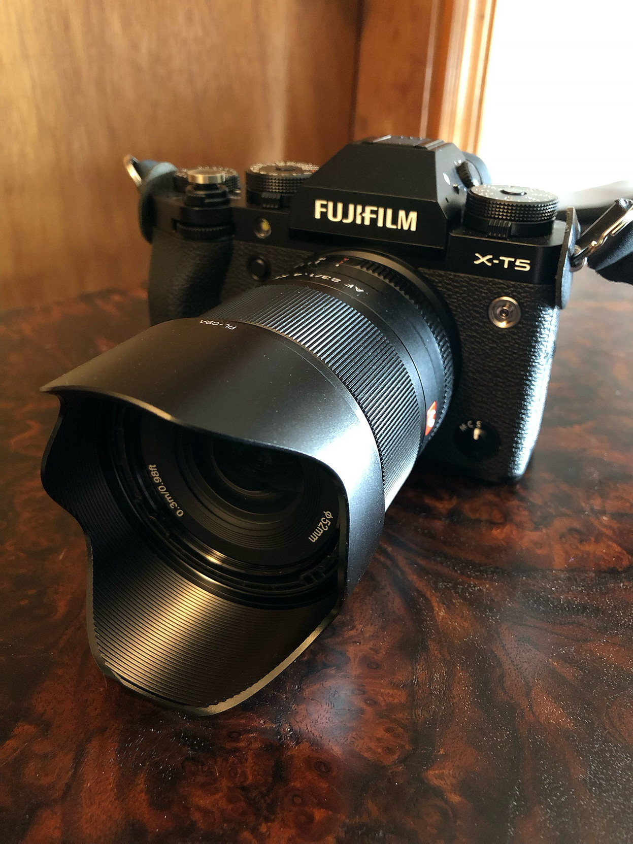 The Fujifilm X-T5, sporting the Viltrox 23mm f/1.4 prime lens. 