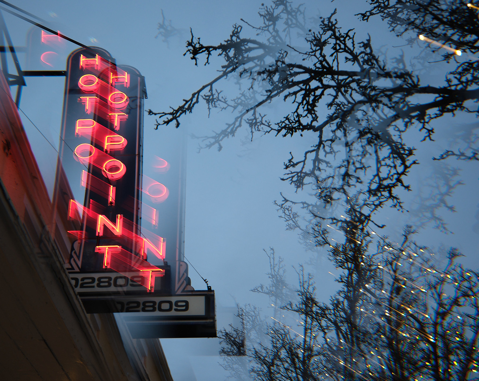 These are a little difficult to describe … the filter tends to add echoes of parts of the image. 

This one has a neon Hotpoint sign, and some holiday lights that are still up.