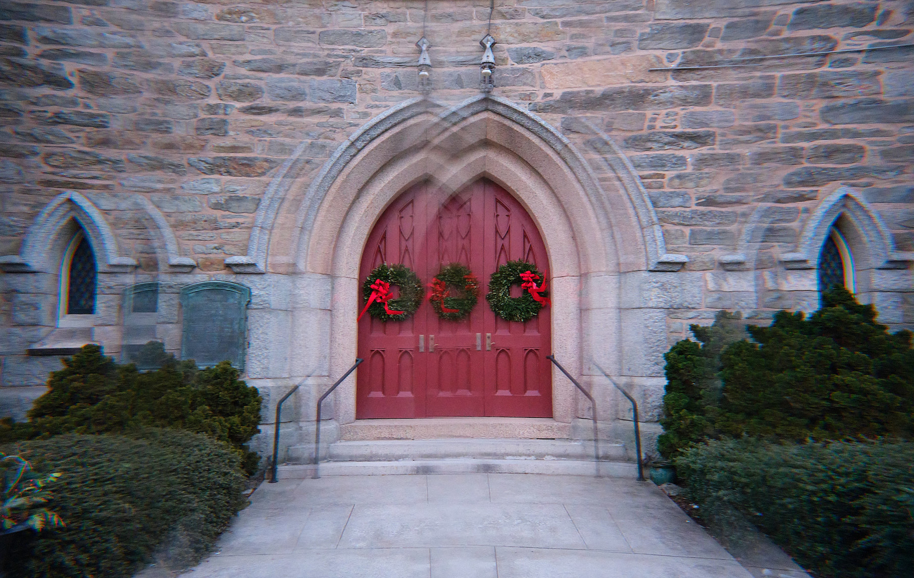 I shot these in a way that maintained symmetry, and they came out looking pretty creepy.

These are from the Congregational church next door.